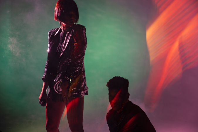 young dancers near smoke