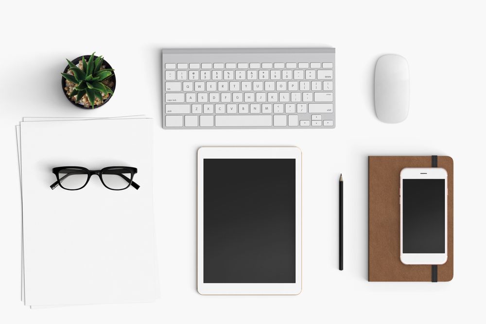 Modern workspace with coffee cup, smartphone and paper copy space