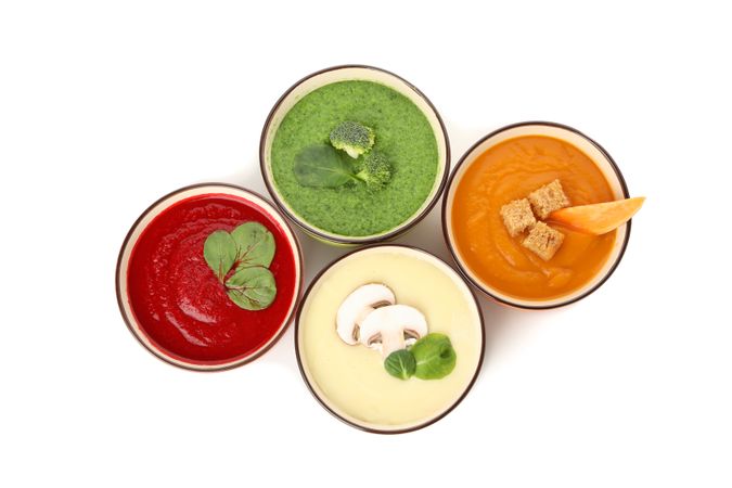 Selection of colorful soups, top view