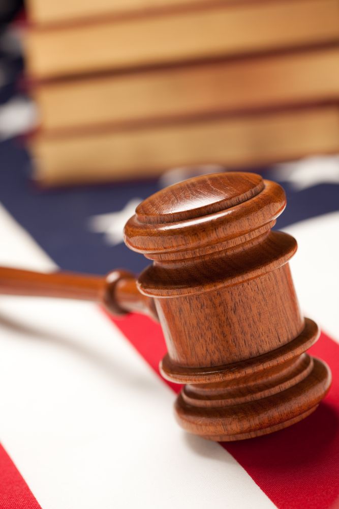 Gavel and Books on Flag