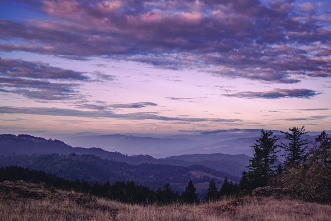 Purple hues over beautiful mountain scene