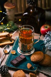 Chocolate and cookies near tea