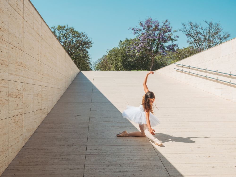 Ballerina performing classical position outside