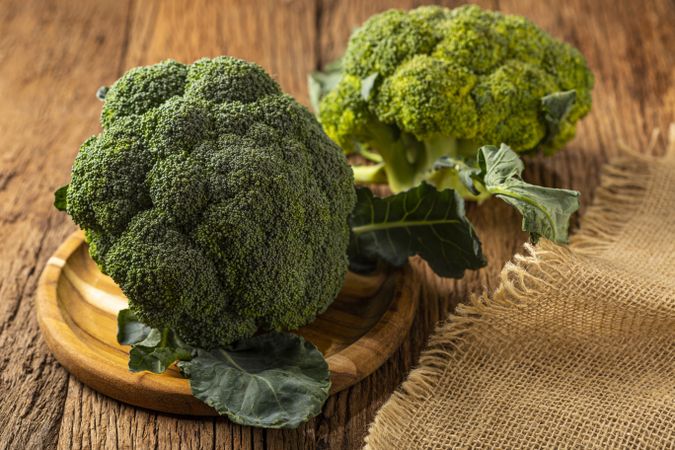 Green organic broccoli on the table.