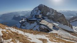 Resort chairlift station in snowy mountains