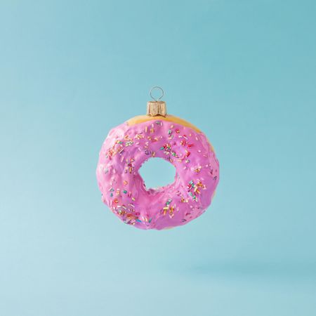 Christmas bauble decoration made of pink donut
