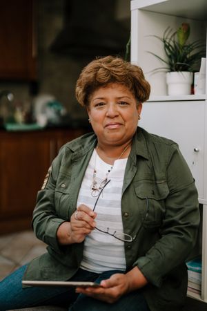 Portrait of older Black woman using tablet