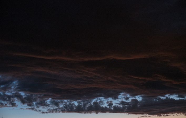 Dark storm clouds in the evening sky