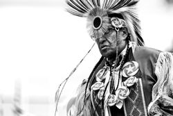 Red Wing, MN, USA - July 8th, 2017: Mature Sioux man in traditional headdress