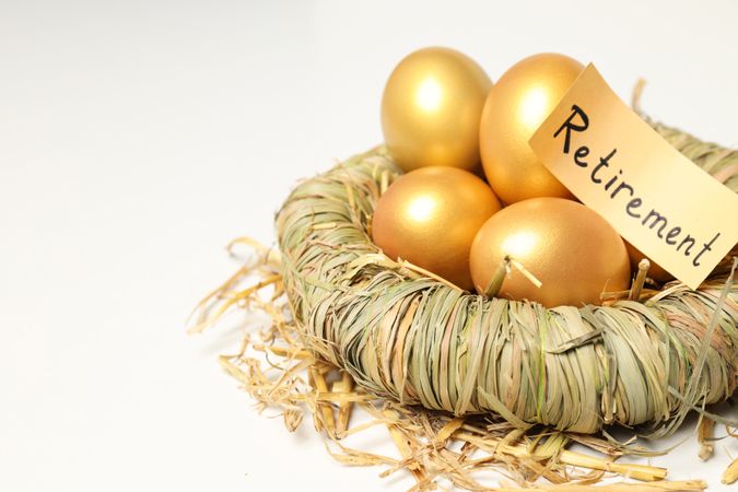 Golden eggs, pension savings, investments, retirement, space for text