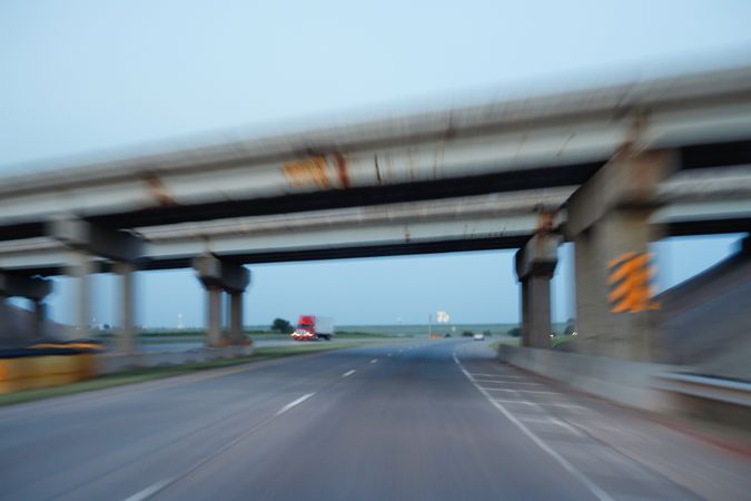 Car driving in blur of speed