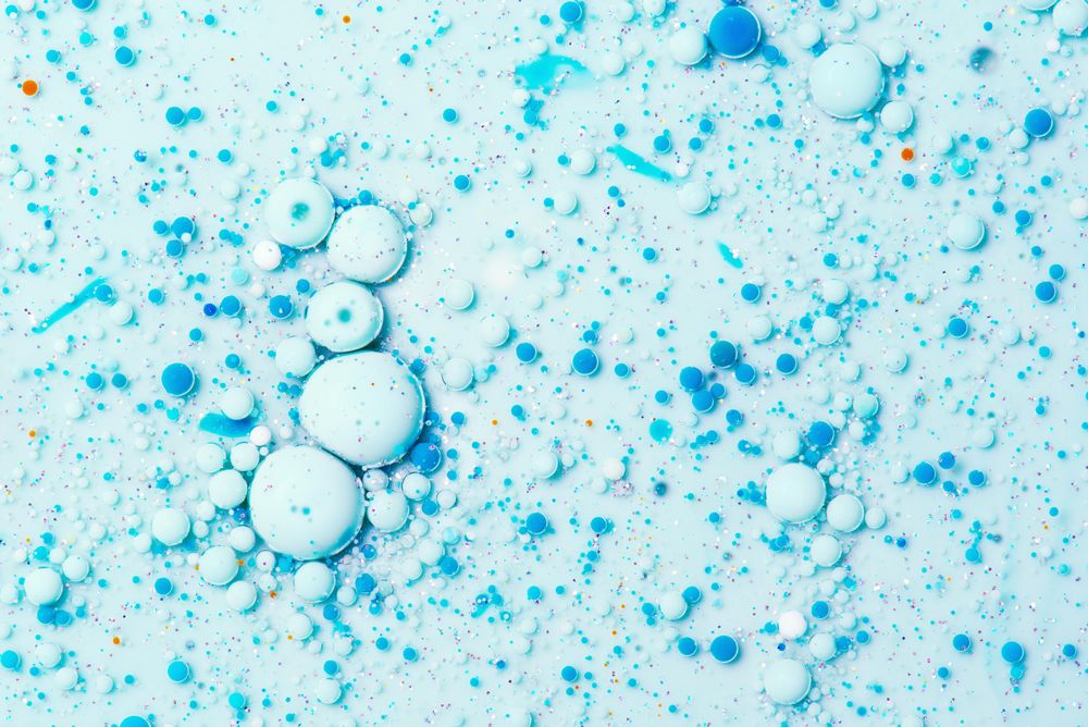 Macro shot of blue bubbles on blue background