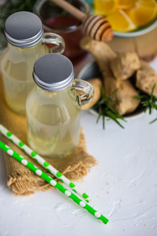 Ginger detox drink in mini glass jugs