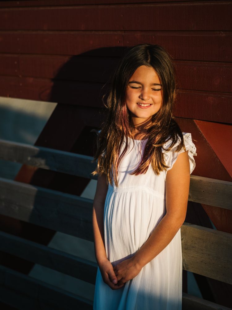 Portrait of adorable girl in sunshine