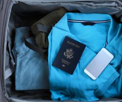 Suitcase packed for travel