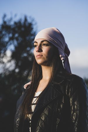 Young woman with cancer bandana