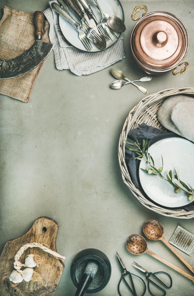Kitchen appliances with a vintage look on concrete background, vertical composition with copy space