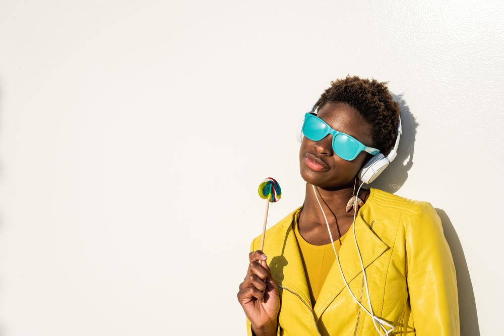 Black woman eating candy