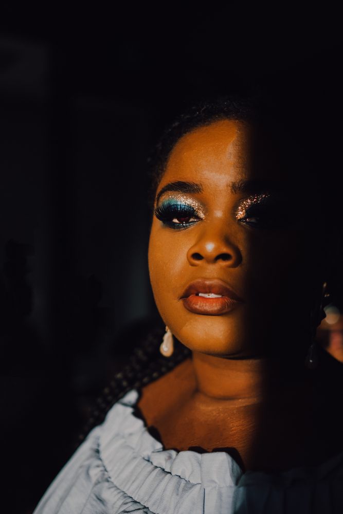Headshot of confident trendy Black woman