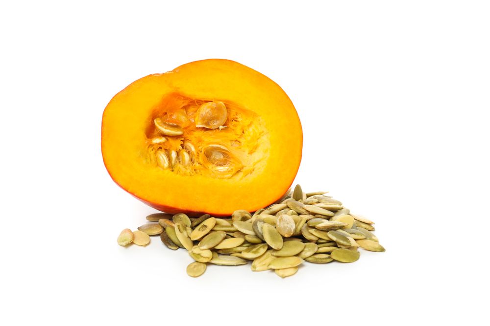 Concept of Autumn vibe food, Pumpkin, Pumpkin seeds, isolated on light background