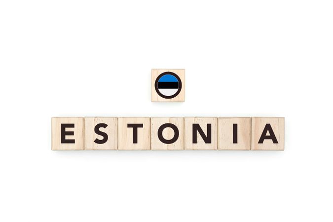 Wooden blocks bearing the name and flag of Estonia.