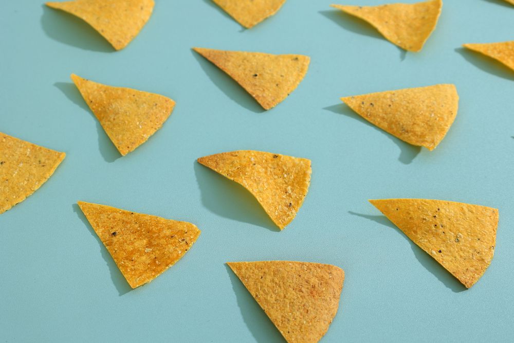 Corn Chips Nachos on Mint Background