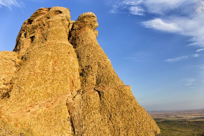 Rough orange rocks in picturesque valley