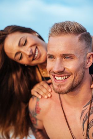 Joyful couple travelers having fun together outdoor