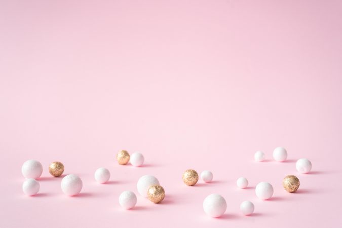 Pink copy space background with gold and glitter decorations