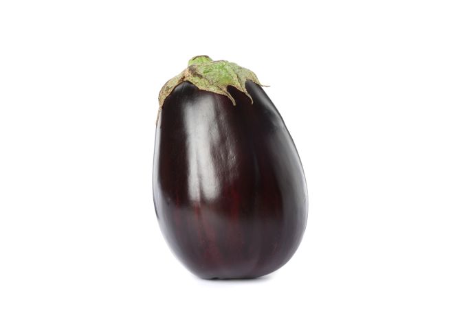 Fresh ripe eggplant isolated on plain background