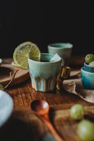 Arrangement of ceramic utensil on wood table