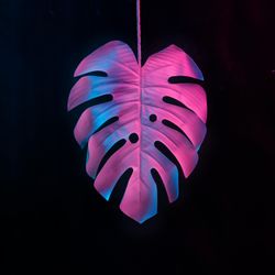 Tropical leaf in vibrant bold gradient blue and pink holographic neon  colors
