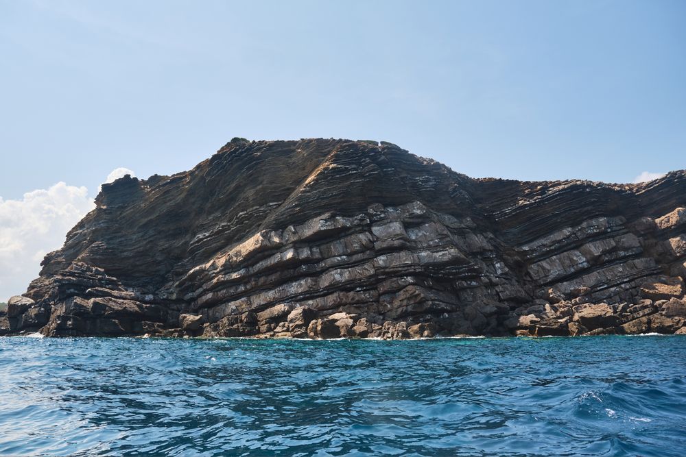 Rocky coast near rippling sea