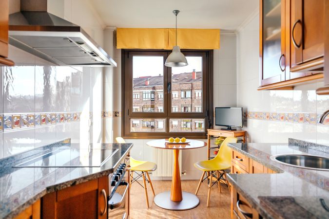 Kitchen on two fronts with dining area