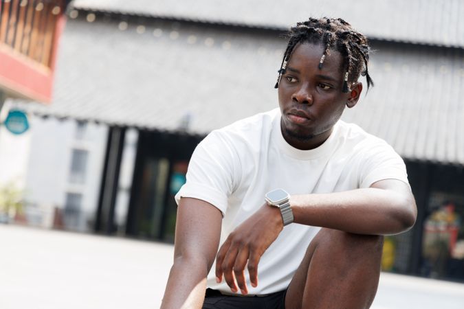 Black man with dreadlocked hair