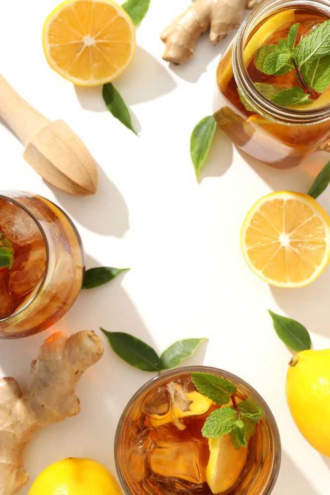 Cold tea with fresh oranges and mint leaves