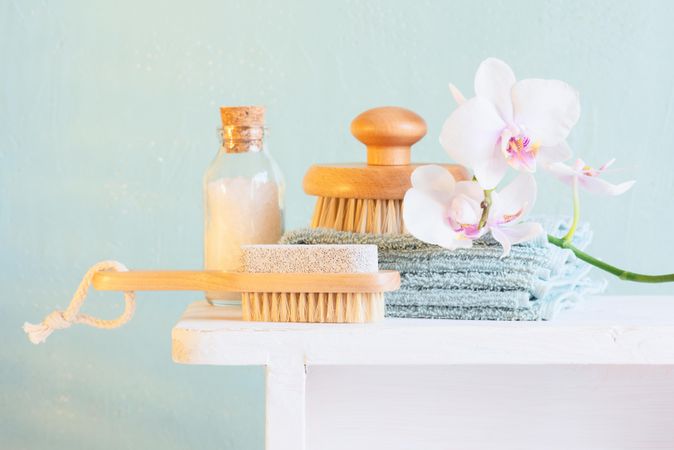 Bathing brushes and salts on bathroom counter