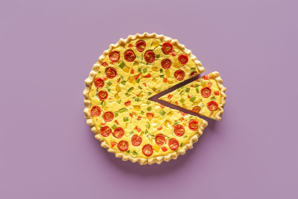 Quiche top view, minimalist on a purple background