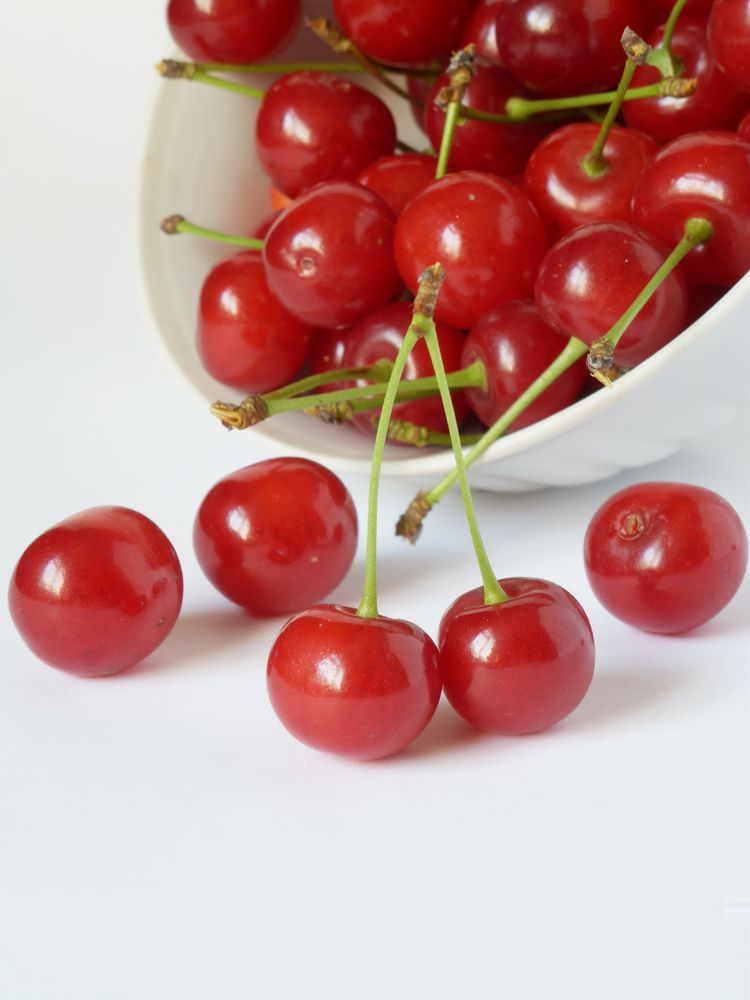 Ripe cherries on a plate