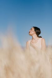 Female standing in field