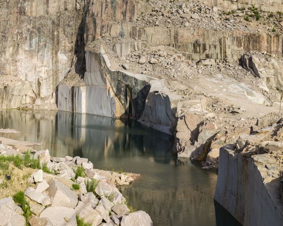 Calm water near stone quarry