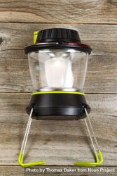 New outdoor battery lantern on rustic wood 4BGNEb