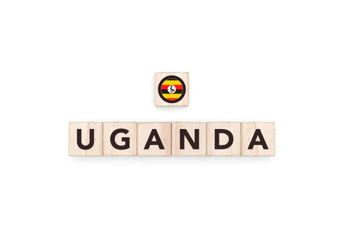 Wooden blocks bearing the name and flag of Uganda.