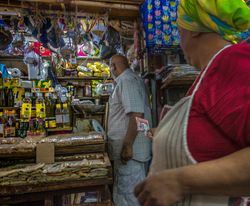 Woman handing man money in Mauritian street market