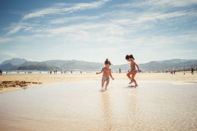 little girls by the seashore