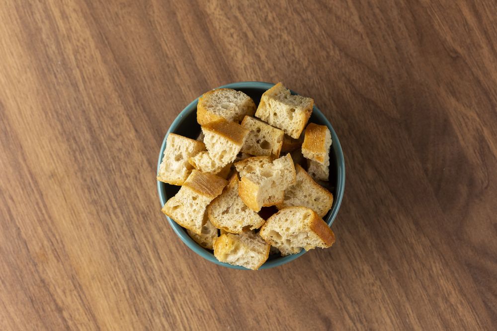 Delicious crunchy croutons on the table.
