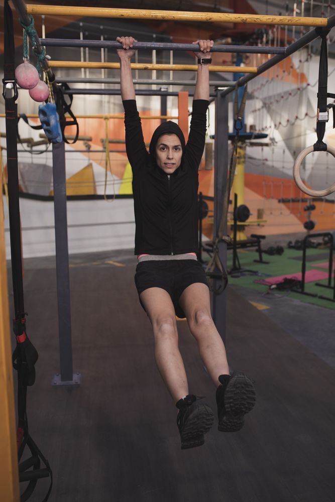 Athletic woman training in gym