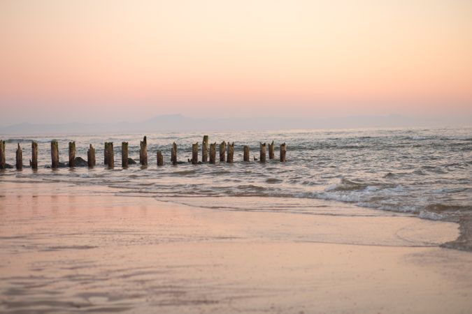 Calm sea on background of pink sky