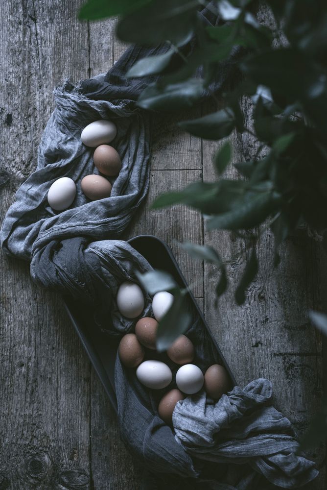 Raw eggs on tablecloth