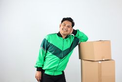 Asian Online Driver Lean on Box, Gojek Grab Delivery Concept